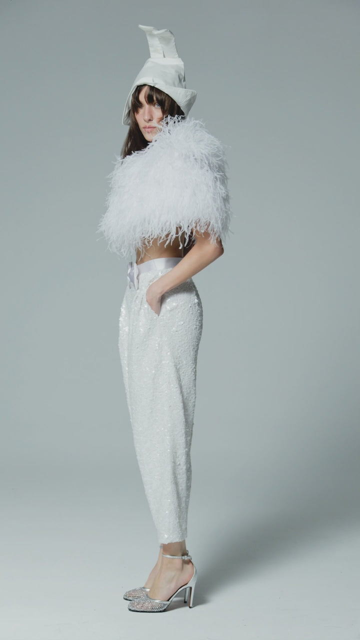 Брюки из ткани, расшитой пайетками, с атласным бантом