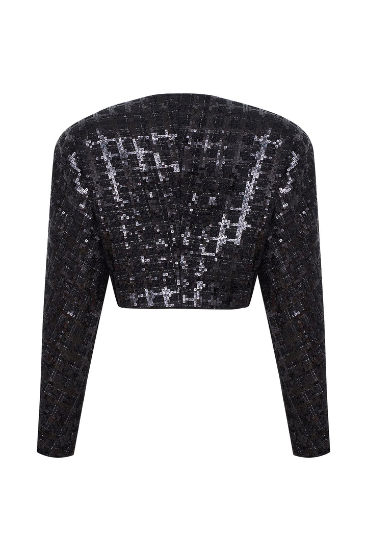 Костюм в клетку с декоративными звездами